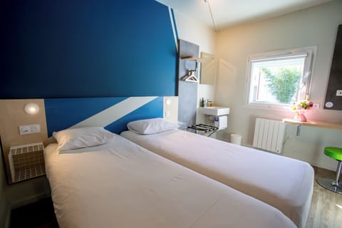 Twin Room, 2 Twin Beds | In-room safe, desk, soundproofing, free cribs/infant beds