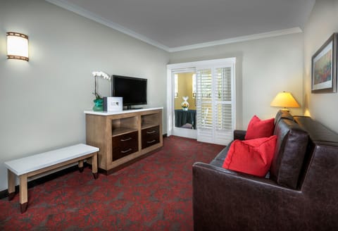 Suite, 2 Queen Beds, Kitchenette | Living room | 37-inch flat-screen TV with cable channels, TV