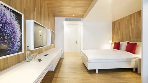 Family Room | Premium bedding, down comforters, in-room safe, desk