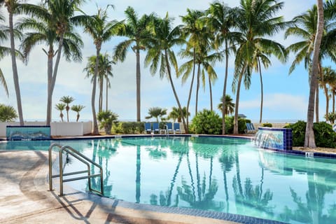 Outdoor pool, pool umbrellas, sun loungers