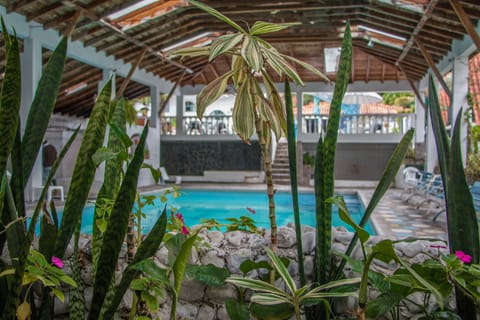 Indoor pool, outdoor pool, open 9:30 AM to 9:30 PM, pool umbrellas