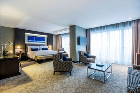 Suite, 1 King Bed | Minibar, in-room safe, individually decorated, individually furnished