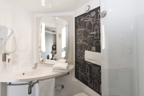 Shower, eco-friendly toiletries, hair dryer, towels