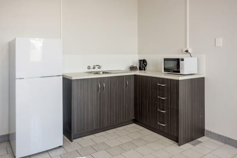 Two Bedroom Apartment | Private kitchen | Fridge, electric kettle