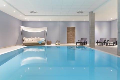 Indoor pool, open 8:00 AM to 10:00 PM, sun loungers