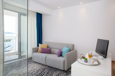 Deluxe Double Room, Balcony, Sea View | Premium bedding, minibar, in-room safe, individually decorated