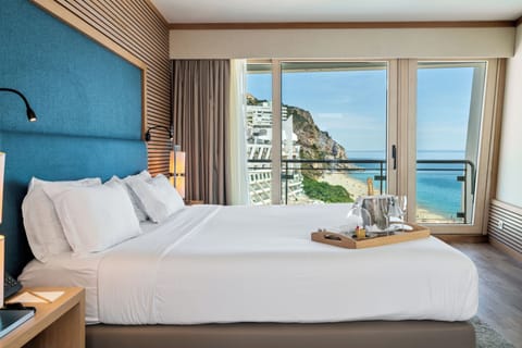 Premium Suite, Ocean View | Minibar, in-room safe, desk, blackout drapes