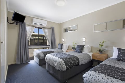 Suite, Multiple Beds, Non Smoking | Pillowtop beds, minibar, desk, laptop workspace