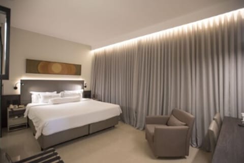 Premium bedding, minibar, in-room safe, laptop workspace