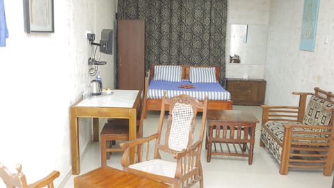 Standard Double Room (with Fan) | Desk, iron/ironing board, free WiFi, bed sheets