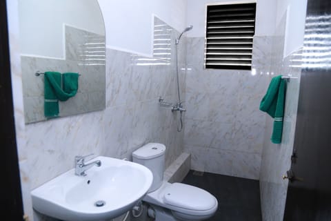 Standard Double or Twin Room (with A/C) | Bathroom | Shower, free toiletries, hair dryer, towels