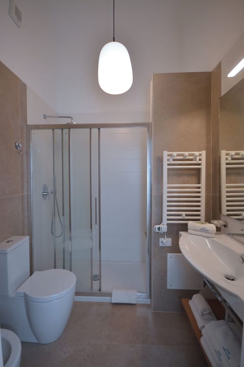 Triple Room, Balcony, Partial Sea View | Bathroom | Shower, free toiletries, hair dryer, bidet