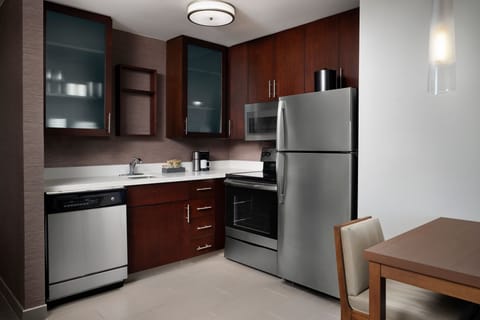 Fridge, microwave, coffee/tea maker, dining tables