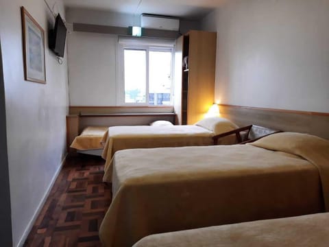 Superior Quadruple Room | Minibar, desk, blackout drapes, free WiFi