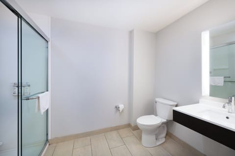 Suite, 1 King Bed, Accessible (Mobility) | Bathroom | Combined shower/tub, free toiletries, hair dryer, towels