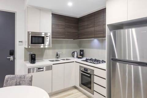 1 Bedroom Mini Ocean Suite | Private kitchenette | Full-size fridge, microwave, oven, stovetop