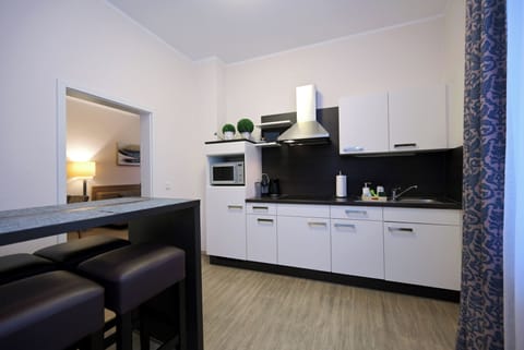 Comfort Apartment, Kitchen, Annex Building (Wormser Str. 11) | Private kitchen | Fridge, microwave