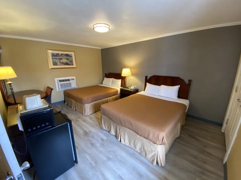 Deluxe Room, 2 Queen Beds | Desk, iron/ironing board, free WiFi, bed sheets