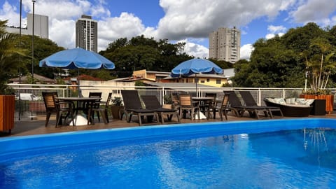 2 outdoor pools, open 8:00 AM to 11:00 PM, pool umbrellas, sun loungers