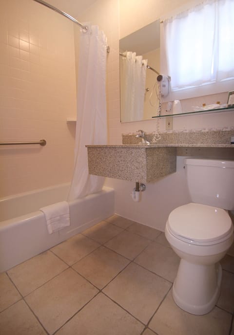 Bathtub, free toiletries, hair dryer, towels