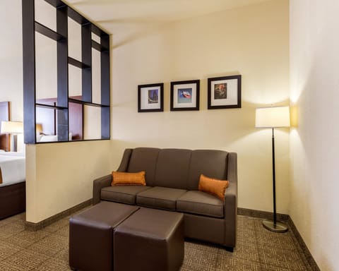 Desk, laptop workspace, iron/ironing board, free cribs/infant beds