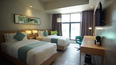 Deluxe Room, 2 Twin Beds | Premium bedding, pillowtop beds, in-room safe, individually decorated