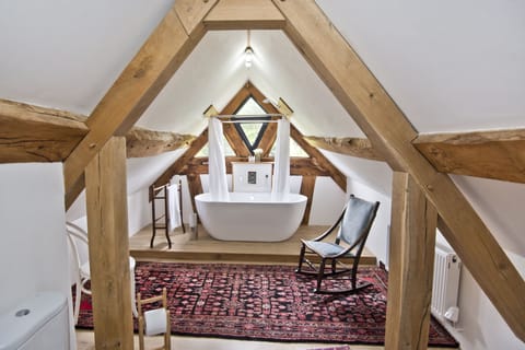 Designer toiletries, hair dryer, towels, soap