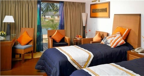 Deluxe Room, Lagoon View | Egyptian cotton sheets, premium bedding, Select Comfort beds, minibar