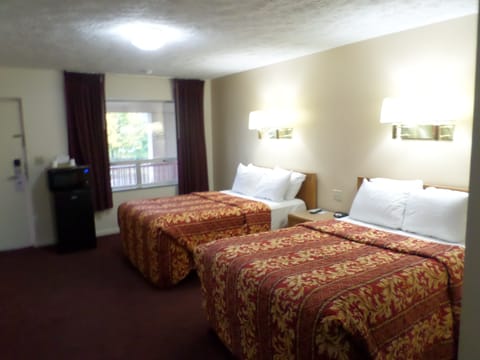 Deluxe Room, 2 Queen Beds, Smoking, Refrigerator & Microwave | Pillowtop beds, individually furnished, desk, blackout drapes