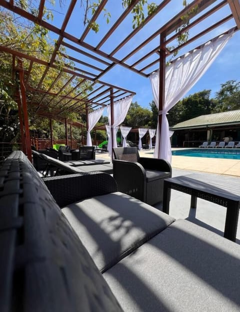 Outdoor pool, open 11:00 AM to 7:00 PM, sun loungers