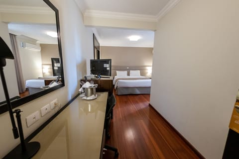 Premium Double Room | Minibar, in-room safe, desk, blackout drapes