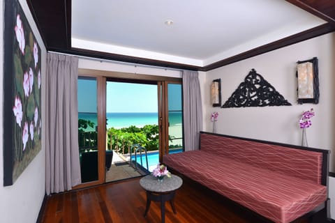 Andaman Beach Suite | Living area | Flat-screen TV, DVD player