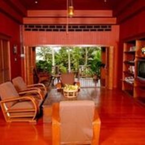 3 Bedroom Baanmai Thai Villa, Free Round-trip Boat Transfer | Living area | Fireplace