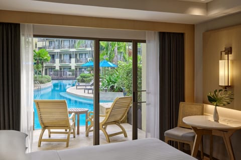 Guest room, 1 King, Pool access | 1 bedroom, premium bedding, down comforters, minibar