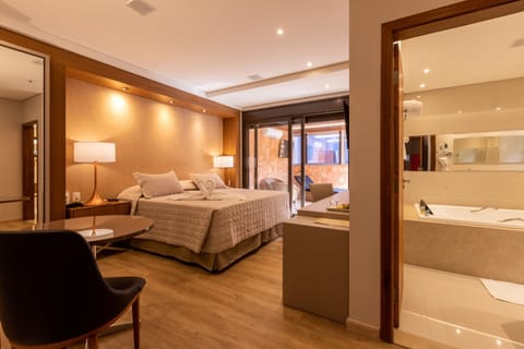 Grand Suite | Minibar, in-room safe, individually decorated, individually furnished