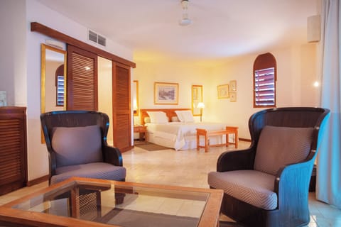 Junior Suite (With Pool Access) | Living area | LCD TV