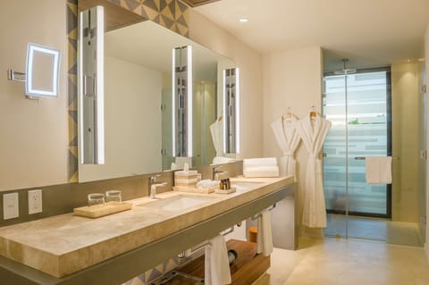 Suite, Lagoon View | Bathroom | Combined shower/tub, eco-friendly toiletries, hair dryer, towels