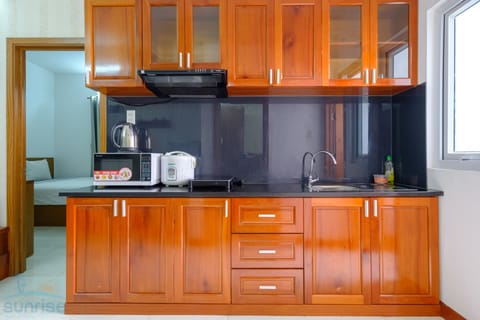 Economy Two-bedroom Apartment with Balcony | Private kitchen | Full-size fridge, microwave, stovetop, electric kettle