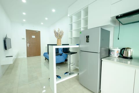 Studio Apartment with Ocean View | Mini-refrigerator
