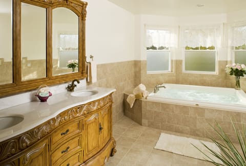 Suite, 1 King Bed (Jacuzzi and Fireplace) | Bathroom | Shower, free toiletries, hair dryer, towels