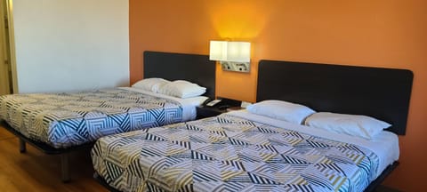 Deluxe Room, 2 Queen Beds, Non Smoking, Refrigerator & Microwave | Free WiFi, bed sheets