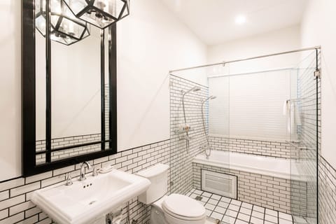 Heritage Deluxe Room | Bathroom | Separate tub and shower, deep soaking tub, rainfall showerhead