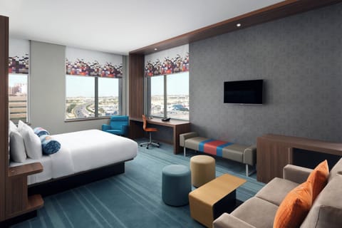 aloft, Suite, 1 King Bed | In-room safe, desk, iron/ironing board, free cribs/infant beds