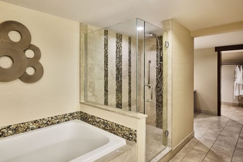 Suite, 1 King Bed, Corner | Bathroom | Separate tub and shower, eco-friendly toiletries, hair dryer, bathrobes