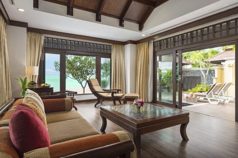 Beachfront Pool Villa Suite (Adult Only) | Living area | 32-inch TV with cable channels