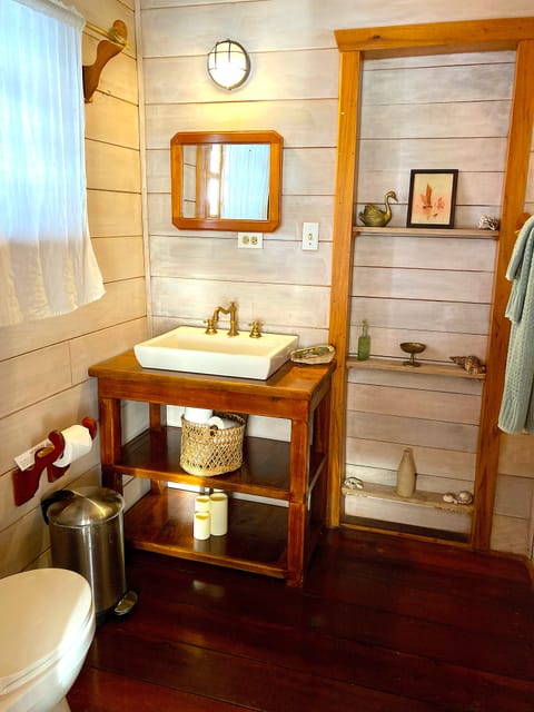 Deluxe Room, Multiple Beds, Kitchenette, Sea View | Bathroom | Shower, hydromassage showerhead, eco-friendly toiletries, hair dryer