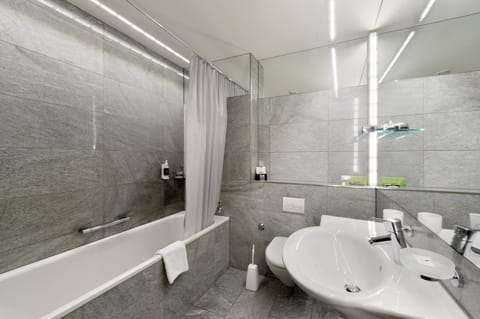 Superior Single Room | Bathroom | Eco-friendly toiletries, hair dryer, slippers, towels