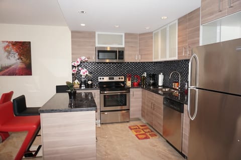 Comfort Apartment, 2 Bedrooms, Ocean View (and Full Bed) | Private kitchen | Fridge, microwave, oven, dishwasher