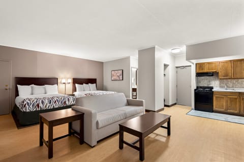 Suite, 2 Queen Beds, Non Smoking, Kitchenette | In-room safe, desk, laptop workspace, blackout drapes