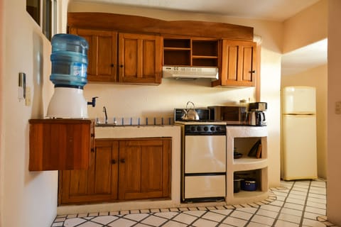 Standard Villa, Sea View | Private kitchen | Full-size fridge, microwave, stovetop, coffee/tea maker